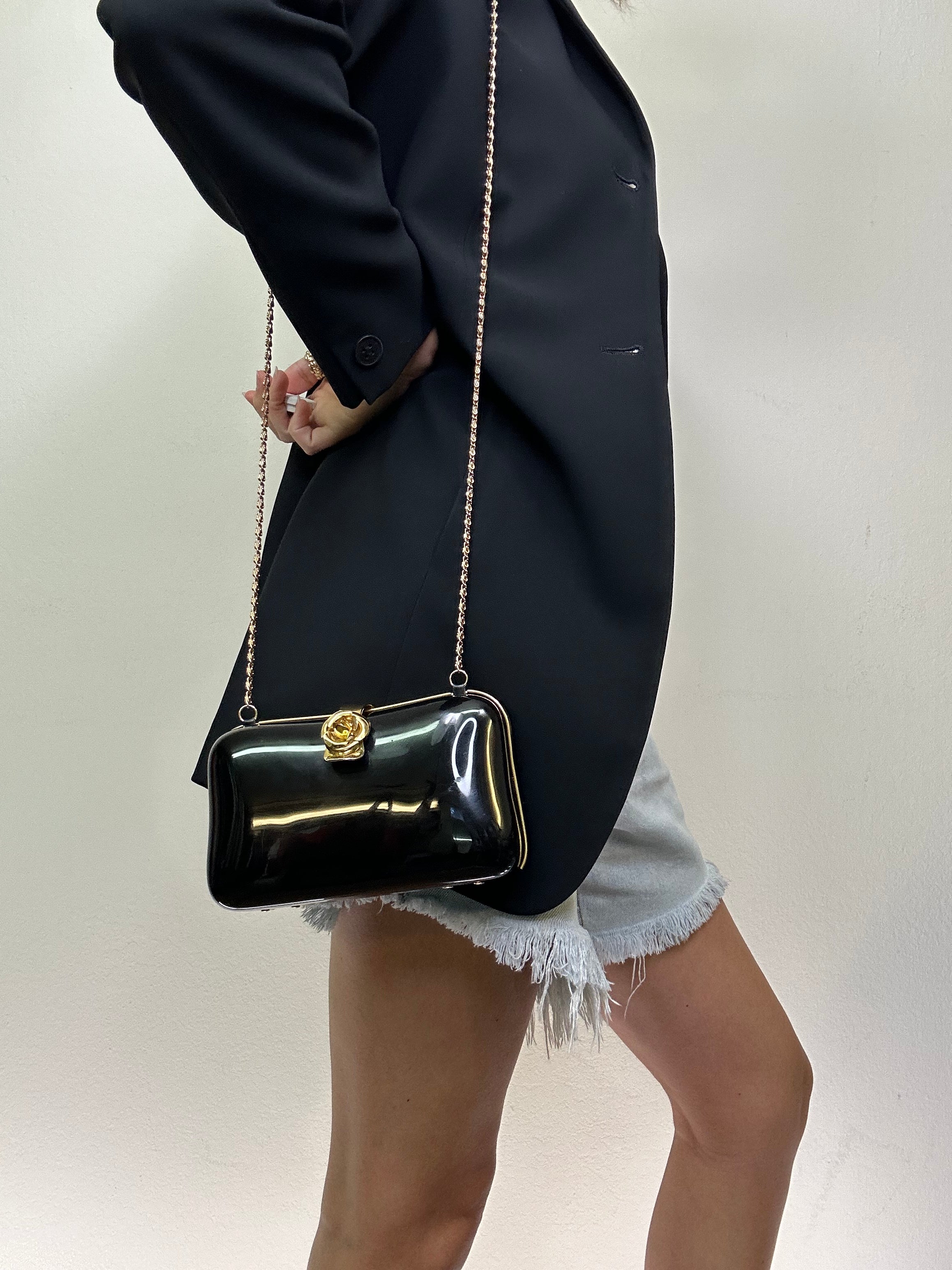 Vintage Black Hard-Shell Bag with Gold Rosette Clasp