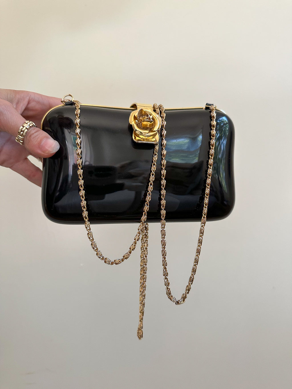 Vintage Black Hard-Shell Bag with Gold Rosette Clasp