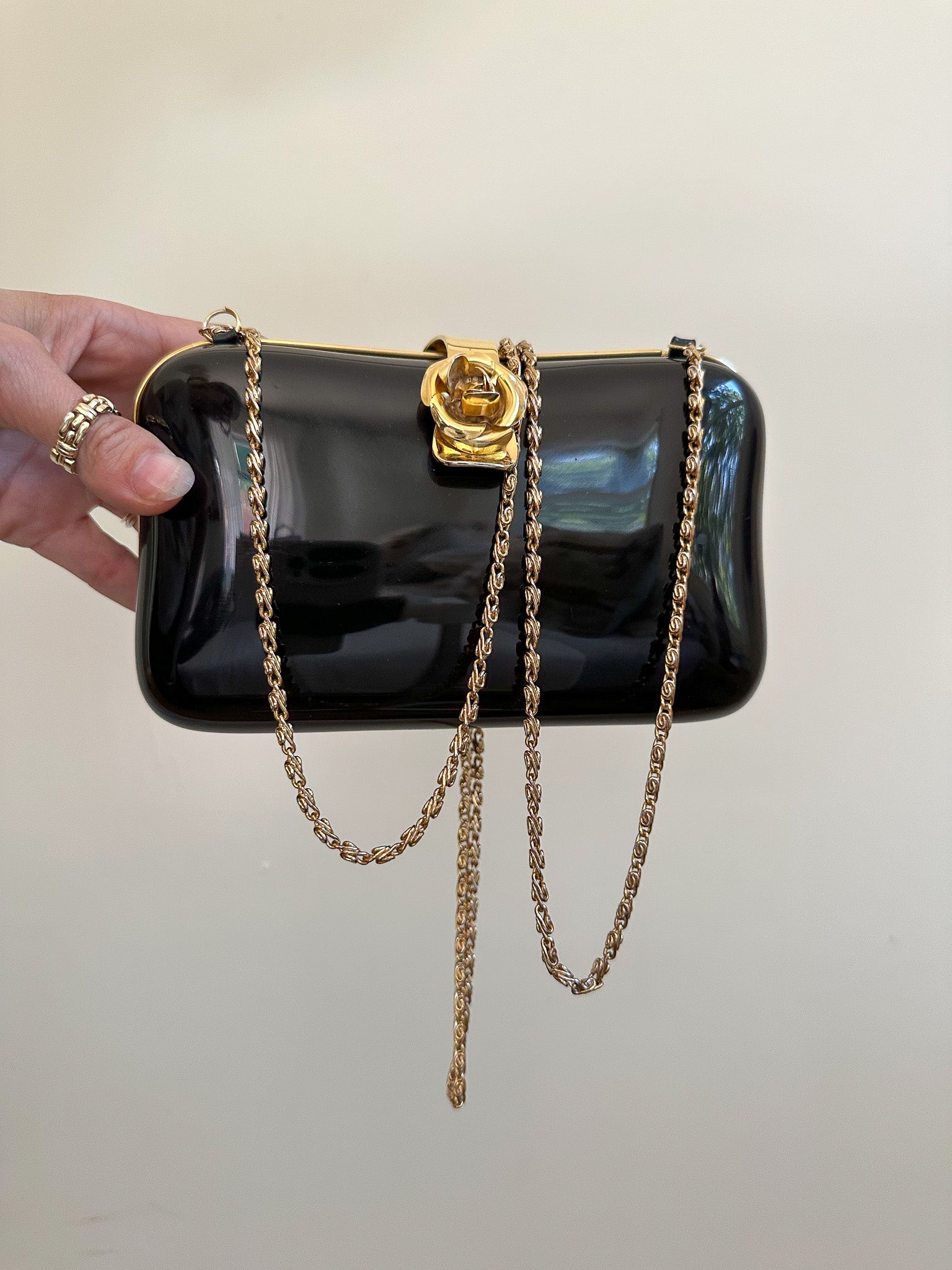 Vintage Black Hard-Shell Bag with Gold Rosette Clasp